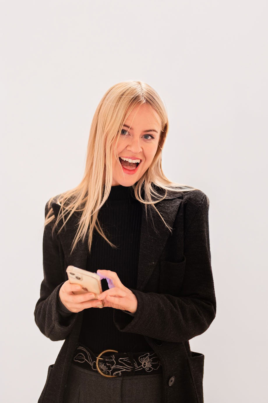 Jocelyn Hanna, Doing something social media-y on her iphone.